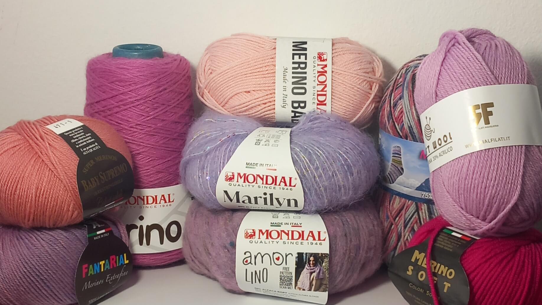 gomitoli di lana, lana merinos, lana di alpaca e altri gomitoli per l'inverno dalle diverse fantasie e colori